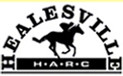 Healesville Racing Club logo. A person rides a horse through an arch.